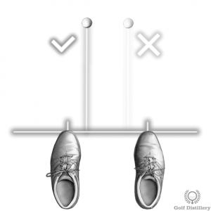 Position the ball forward in your stance when hitting from an uphill lie